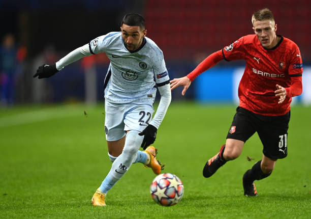 RENNES, FRANCE - NOVEMBER 24: Hakim Ziyech of Chelsea takes on Adrien Truffert of Stade Rennais FC during the UEFA Champions League Group E stage match between Stade Rennais and Chelsea FC at Roazhon Park on November 24, 2020 in Rennes, France. Sporting stadiums around France remain under strict restrictions due to the Coronavirus Pandemic as Government social distancing laws prohibit fans inside venues resulting in games being played behind closed doors. (Photo by Darren Walsh/Chelsea FC via Getty Images)