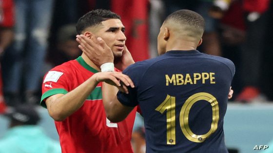 France's forward #10 Kylian Mbappe comforts Morocco's defender #02 Achraf Hakimi at the end of the Qatar 2022 World Cup semi-final football match between France and Morocco at the Al-Bayt Stadium in Al Khor, north of Doha on December 14, 2022. (Photo by KARIM JAAFAR / AFP)